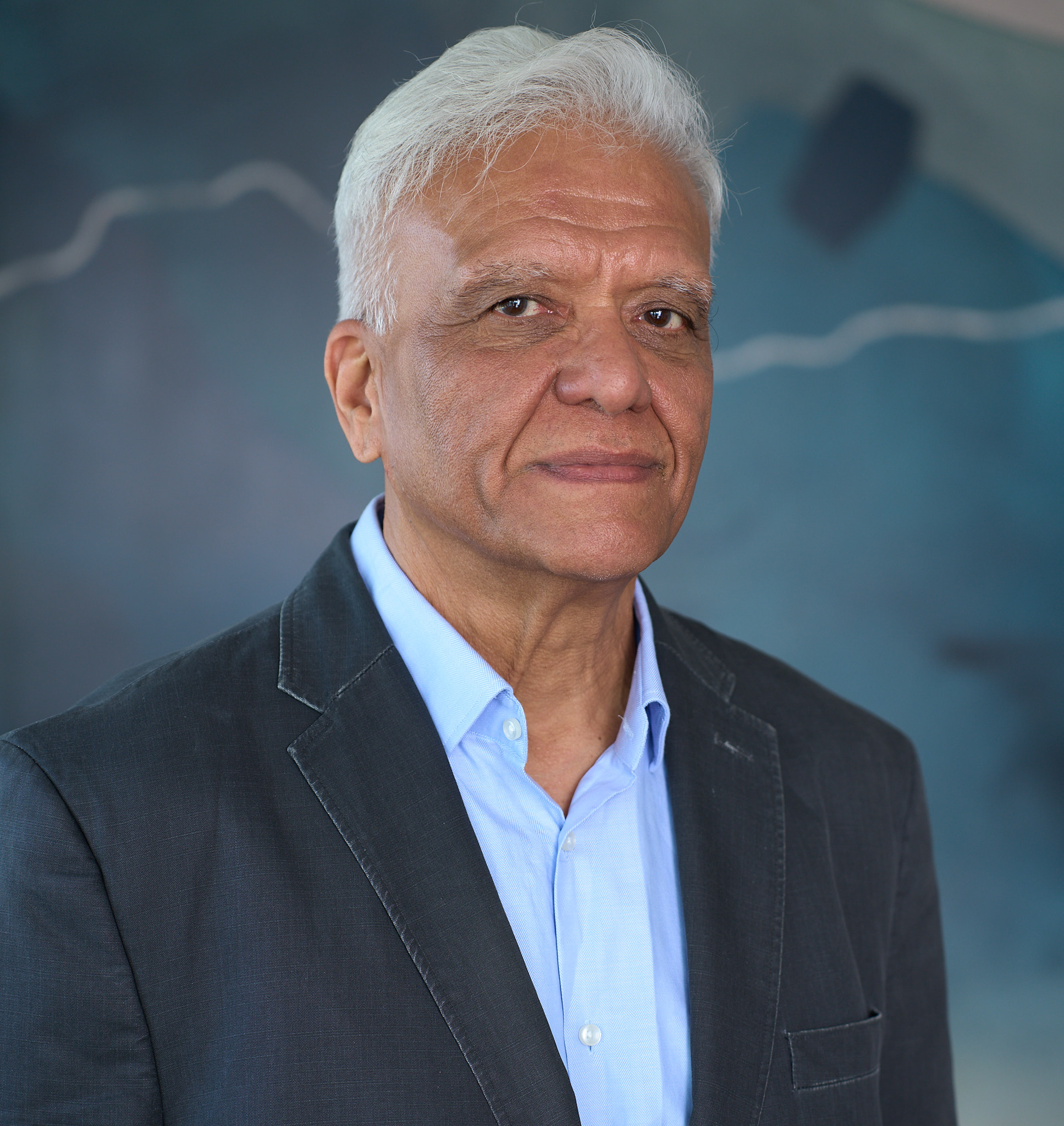 Upinder Raisauda in a polished executive character headshot