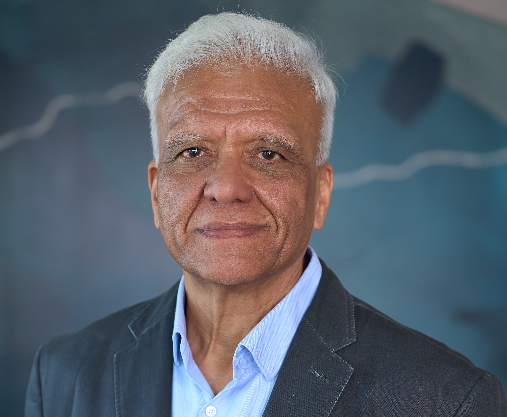 Upinder Raisauda in a professional headshot with restrained warmth